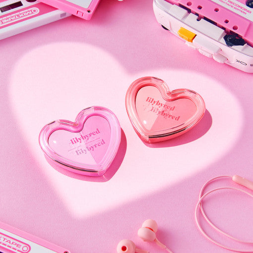 ProtoClinical k-beauty cosmetic packaging detail in soft pink tones on a light background.