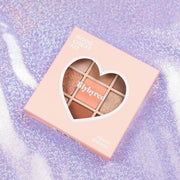 ProtoClinical k-beauty cosmetic graphic with a warm peach center on a lavender background.
