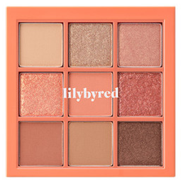 ProtoClinical k-beauty cosmetic packaging in peach tones on a light background.