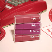 ProtoClinical k-beauty lilybyred Mood Liar Velvet Tint 4.2g deep berry lip tint swatch with a rounded lower edge on a pale beige background