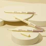 ProtoClinical k-beauty lilybyred Smiley Aegyosal Eyeliner 0.32g single beige eyeliner package laid horizontally on a cream background with olive side shading