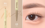 ProtoClinical k-beauty lilybyred Smiley Aegyosal Eyeliner 0.32g wide beige swatch beside a warm rose stripe on a pale cream background