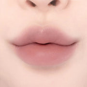 ProtoClinical k-beauty lilybyred Smiley Lip Blending Stick 0.8g rosy pink lip swatch in a wide horizontal band on a pale cream background