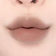 ProtoClinical k-beauty lilybyred Smiley Lip Blending Stick 0.8g single lip swatch in a wide horizontal band on a pale cream background