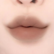 ProtoClinical k-beauty lilybyred Smiley Lip Blending Stick 0.8g single lip swatch in a wide horizontal band on a pale cream background