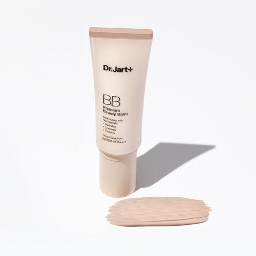 ProtoClinical k-beauty beauty product packaging with a tall beige silhouette and soft green lower accents on a light background.