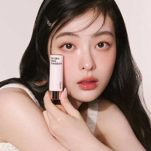 ProtoClinical k-beauty warm peach beauty graphic with dark brown side panels on a light background.