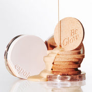 ProtoClinical k-beauty soft peach and beige beauty graphic with pale teal side accents on a light background.