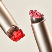 ProtoClinical k-beauty warm beige and brown beauty product set on a soft pink background.