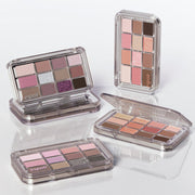 ProtoClinical k-beauty grouped skincare packaging photo in muted mauve tones on a light background.