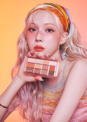 ProtoClinical k-beauty warm orange and violet beauty graphic with a soft vertical center on a light background.