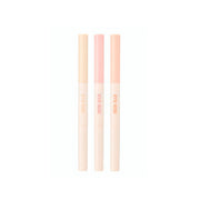 ProtoClinical k-beauty THE FACE SHOP EYE RISE Dual Under Eye Maker 0.6g single pale yellow slim under-eye maker package angled diagonally on a pale lavender background