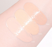 ProtoClinical k-beauty warm beige makeup swatch on a light background.