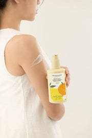 ProtoClinical k-beauty THE FACE SHOP The Botanic Lemon Verbena Body Lotion 350ml single upright pale yellow lotion bottle centered on a white background with pale lavender side panels
