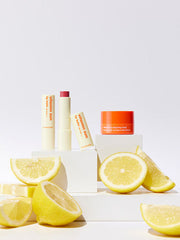 ProtoClinical k-beauty THE FACE SHOP Vitamin Sun Lip Balm SPF 22 PA+++ 3.9g single bright yellow lip balm package centered with pale blue side accents on a clean white background