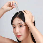 ProtoClinical k-beauty warm beige beauty detail with a dark taupe vertical center on a soft neutral background.