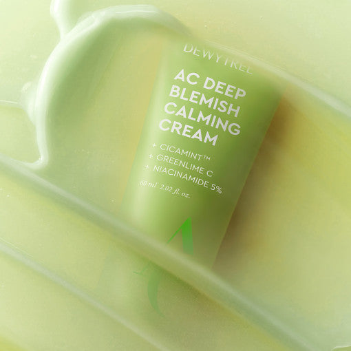 ProtoClinical k-beauty DEWYTREE AC Deep Blemish Calming Cream 60ml close-up of a lime green tube framed by glossy cream swirls on a soft yellow-green background