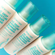 ProtoClinical k-beauty DEWYTREE AC Deep Moisture Barrier Calming Ampoule 60ml single aqua package centered on a bright aqua background in a portrait product shot