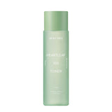 ProtoClinical k-beauty DEWYTREE HEARTLEAF 100 Toner 200ml pale green toner bottle shown angled upright with a long shadow on a white background