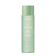 ProtoClinical k-beauty DEWYTREE HEARTLEAF 100 Toner 200ml pale green toner bottle shown angled upright with a long shadow on a white background