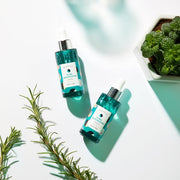 ProtoClinical k-beauty DEWYTREE Miracle Pore Minimizing Serum 30ml single upright gray serum bottle centered on a pale background with soft green and peach side accents
