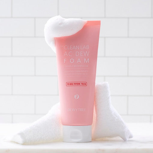 ProtoClinical k-beauty DEWYTREE The Clean Lab AC Dew Foam 150ml single upright pink cleansing foam tube centered on a pale aqua background.