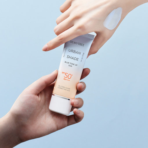 ProtoClinical k-beauty DEWYTREE Urban Shade Blue Tone Up Sun 40g single upright sunscreen tube centered on a light background