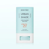 ProtoClinical k-beauty DEWYTREE Urban Shade Cool Calming Sun Stick SPF50+ PA++++ 20g single upright sun stick centered on a pale aqua and lilac background.