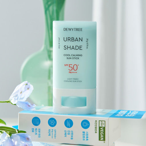 ProtoClinical k-beauty DEWYTREE Urban Shade Cool Calming Sun Stick SPF50+ PA++++ 20g single upright blue sun stick centered on a pale aqua background.