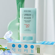 ProtoClinical k-beauty DEWYTREE Urban Shade Cool Calming Sun Stick SPF50+ PA++++ 20g single upright blue sun stick centered on a pale aqua background.