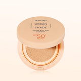 ProtoClinical k-beauty DEWYTREE Urban Shade Cover & Fit Sun Cushion SPF50+ PA++++ 14g single round sun cushion compact centered on a peach and pale aqua background.