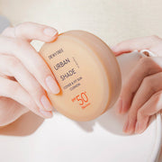 ProtoClinical k-beauty DEWYTREE Urban Shade Cover & Fit Sun Cushion SPF50+ PA++++ 14g single round sun cushion compact centered on a light background.
