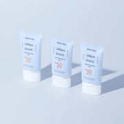 ProtoClinical k-beauty DEWYTREE Urban Shade Moisture Repair Sun SPF50+ PA++++ 50ml single upright blue sunscreen tube on a light background.