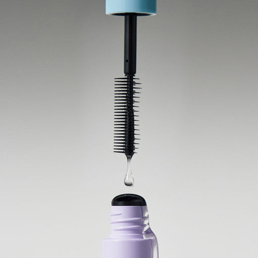 ProtoClinical k-beauty soft gray beauty product silhouettes with dark upper accents on a muted light background.