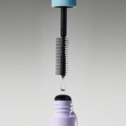 ProtoClinical k-beauty soft gray beauty product silhouettes with dark upper accents on a muted light background.