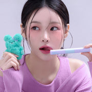 ProtoClinical k-beauty mauve vertical beauty product with teal side accents and a pink lower section on a light background.