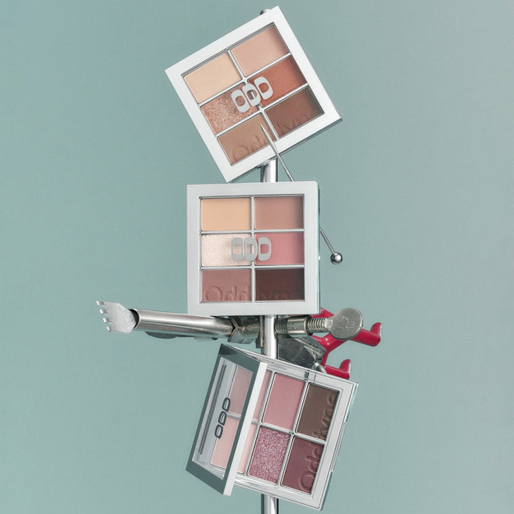 ProtoClinical k-beauty mauve beauty graphic with a soft beige center on a muted purple background.