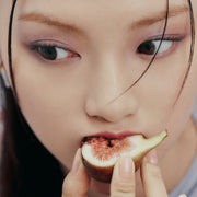 ProtoClinical k-beauty warm beige beauty graphic with a soft central highlight and dark lower-left shadow.