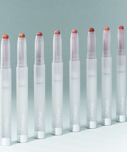 ProtoClinical k-beauty Oddtype New Rules Blur Balm single upright dark gray blur balm package centered on a pale blue-gray background