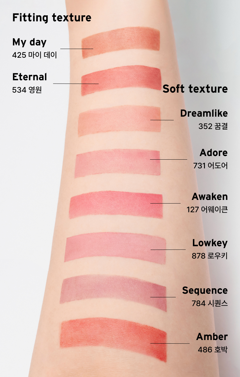 ProtoClinical k-beauty Oddtype New Rules Blur Balm single vertical coral lip balm swatch centered on a pale background with soft aqua side shading