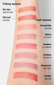 ProtoClinical k-beauty Oddtype New Rules Blur Balm single vertical coral lip balm swatch centered on a pale background with soft aqua side shading