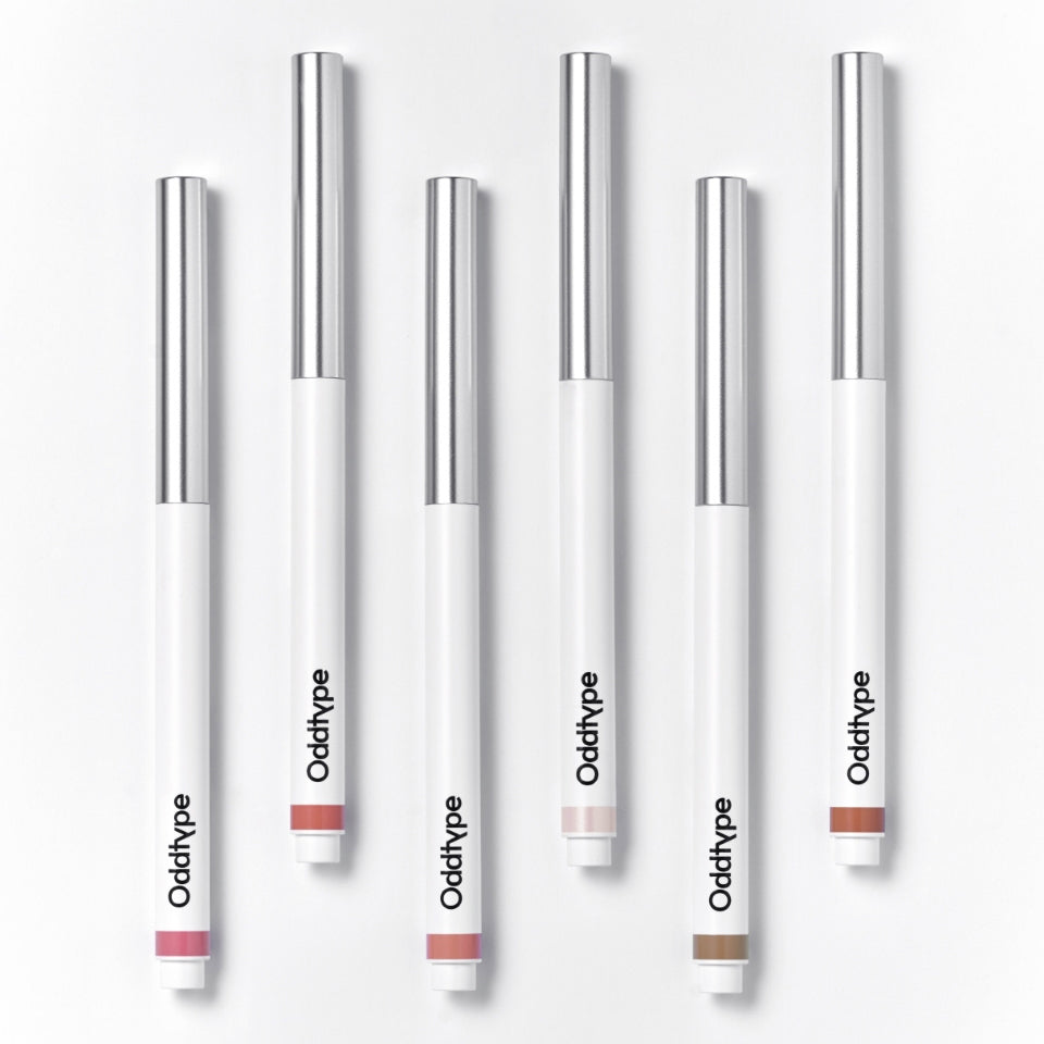 ProtoClinical k-beauty Oddtype New Rules Lip Liner single upright cool gray lip liner package centered on a clean white background
