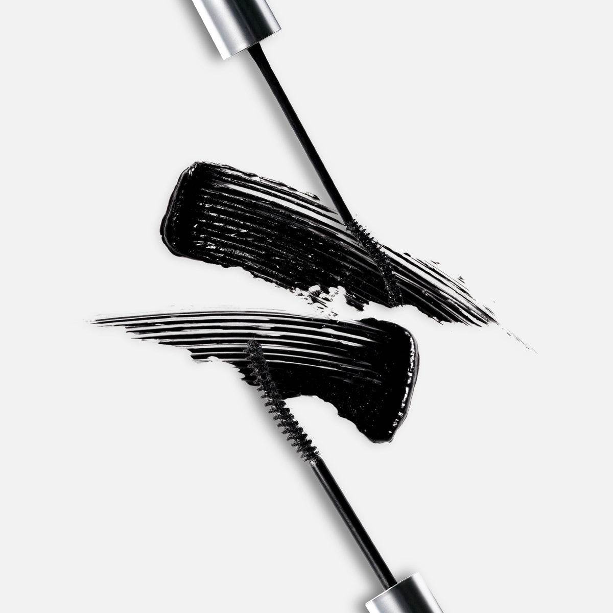 ProtoClinical k-beauty Oddtype Unlimited Curl Lift Mascara single dark angled mascara silhouette on a white background with soft lavender side shading