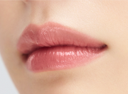 ProtoClinical k-beauty Oddtype Unscene Dew Glow Balm single horizontal warm beige lip balm swatch with darker side shading on a pale background