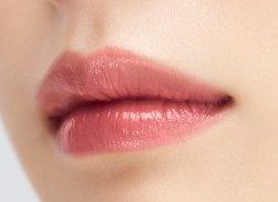 ProtoClinical k-beauty Oddtype Unscene Dew Glow Balm single horizontal rose-brown lip balm swatch on a pale background
