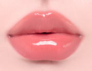 ProtoClinical k-beauty Oddtype Unseen Balloon Tint bright pink lip tint swatch centered on a pale pink background with soft green corner accents