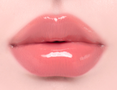 ProtoClinical k-beauty Oddtype Unseen Balloon Tint bright pink lip tint swatch centered on a pale pink background with soft green corner accents