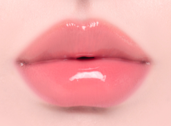 ProtoClinical k-beauty Oddtype Unseen Balloon Tint bright pink lip tint swatch centered on a pale pink background with soft green corner accents