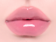 ProtoClinical k-beauty Oddtype Unseen Balloon Tint bright pink lip tint swatch centered on a pale pink background with soft green corner accents