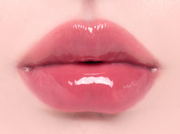 ProtoClinical k-beauty Oddtype Unseen Balloon Tint bright pink lip tint swatch centered on a pale pink background with soft green corner accents